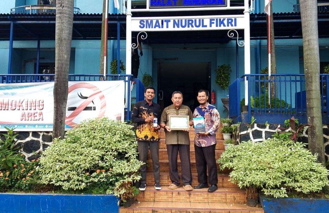 Laporkan Donasi Palestina, DT Peduli Depok Kunjungi SMAIT Nurul Fikri 