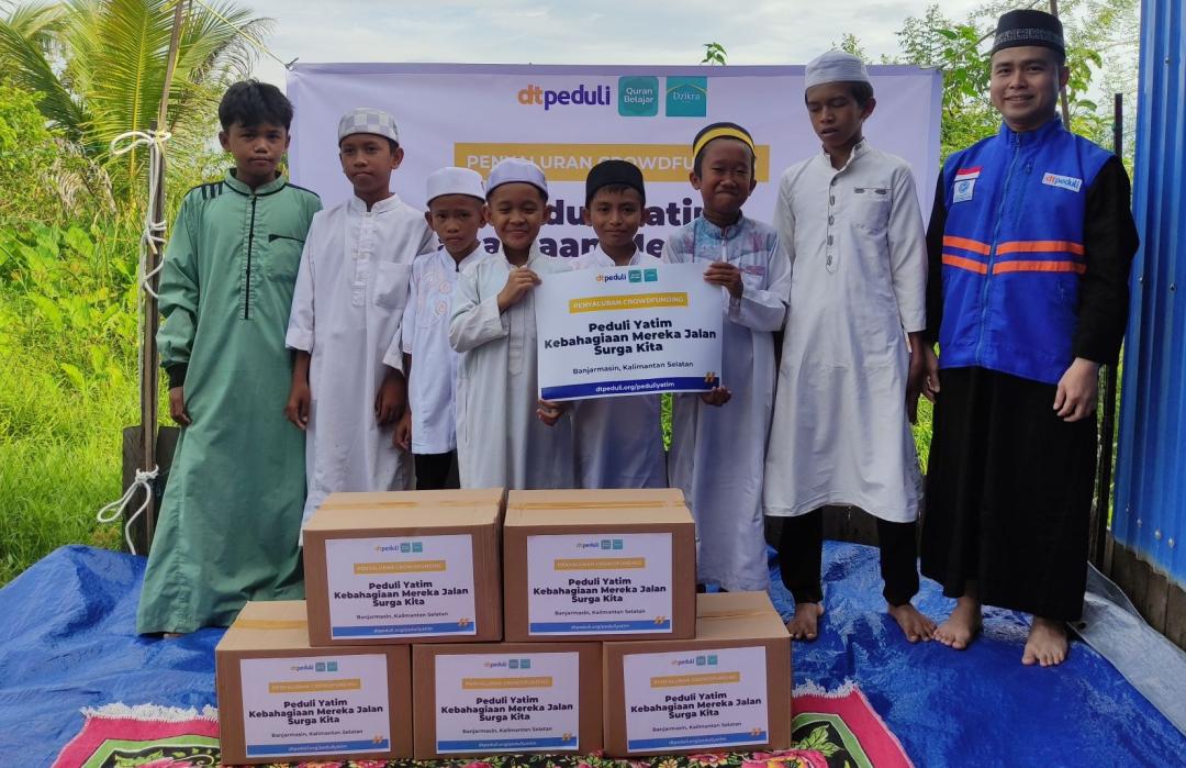 Berbagi Kebahagiaan untuk Yatim dan Dhuafa, QBI dan Dzikra Bersama DT Peduli Kalsel Gelar Kegiatan Sosial 