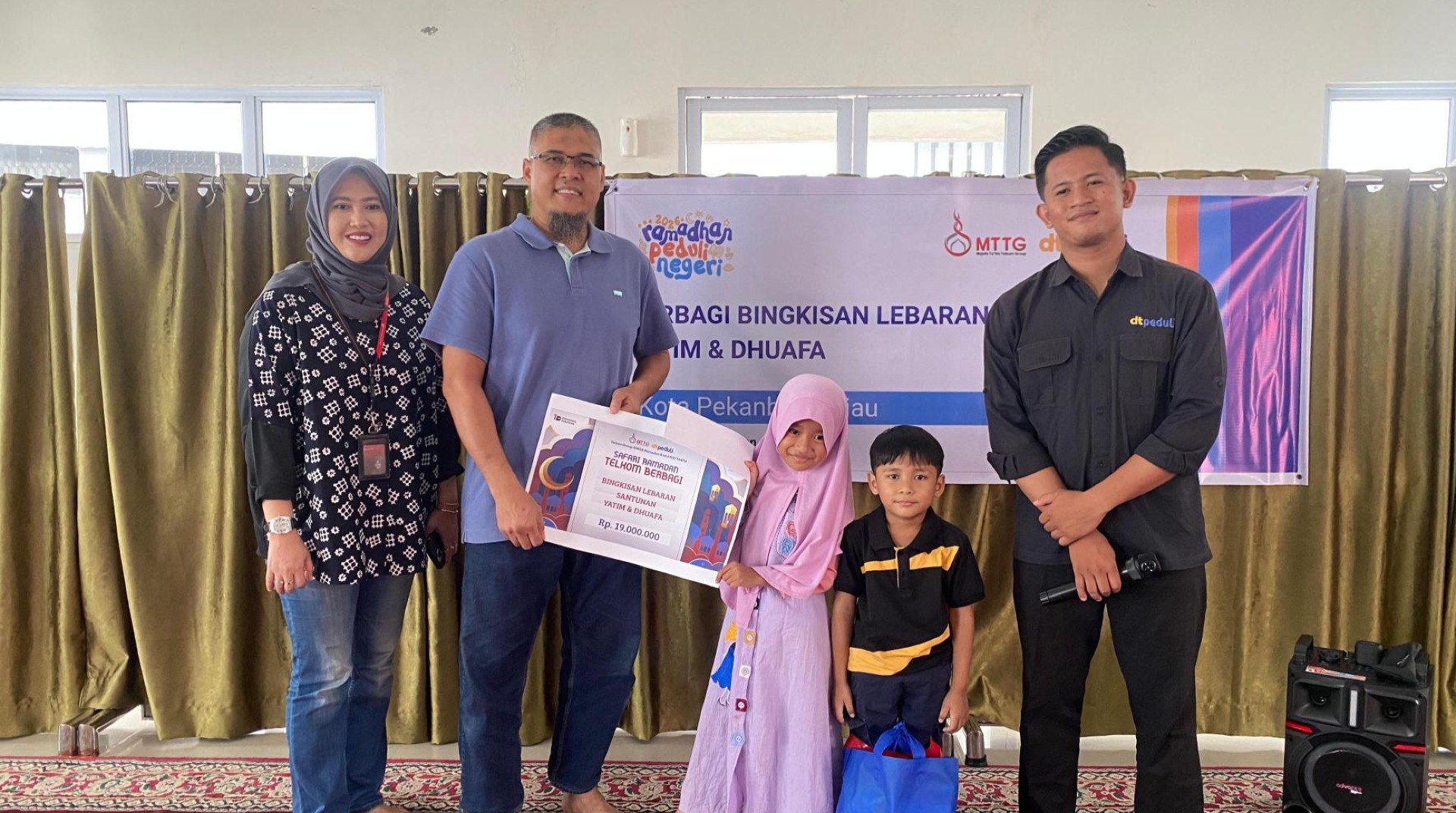 Jelang Idulfitri, DT Peduli Riau dan MTTG Witel Riau Hadirkan Senyum Anak Yatim dan Dhuafa Melalui Santunan Bingkisan Lebaran 