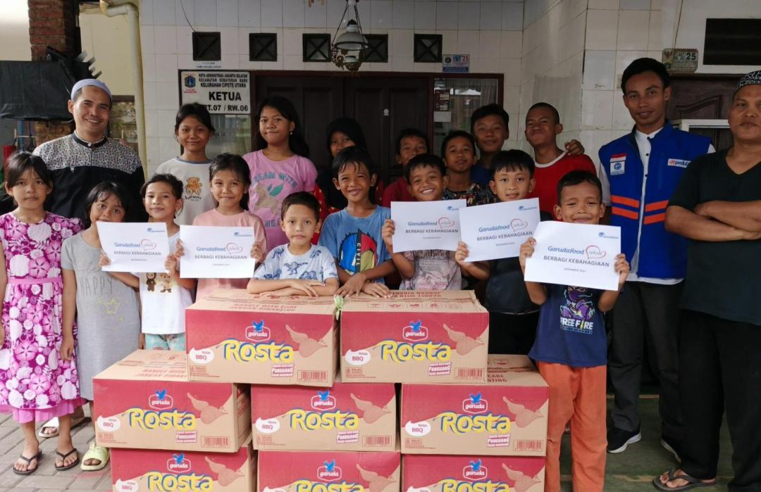 DT Peduli Jakarta dan Garuda Food Salurkan 30 Paket Snack untuk Anak Yatim di Jakarta